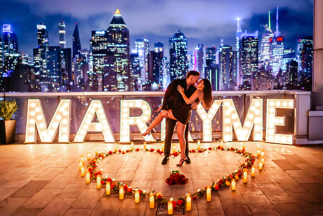 MARRY ME sign engagement in NYC
