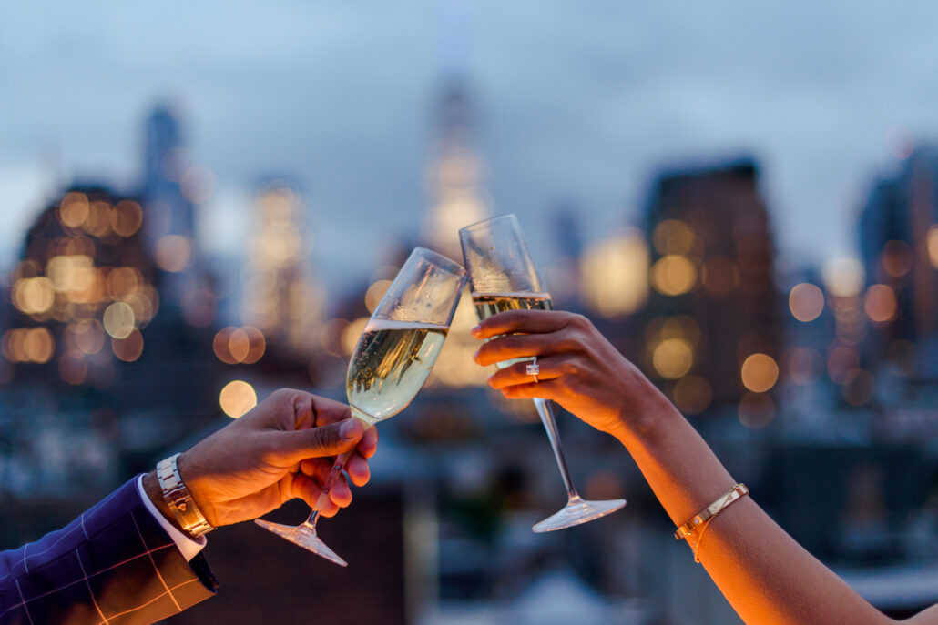 Champagne toast for a NYC rooftop marriage proposal
